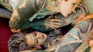 Tattooed informal girls are engaged in anal threesome