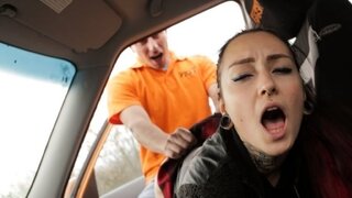 An informal woman passes for a license, satisfying the instructor